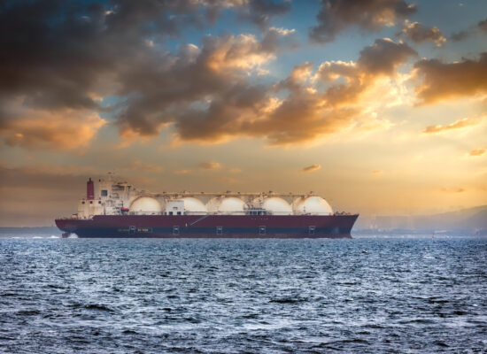 A Liquid Natural Gas tanker (LNG) in Japan"u2019s Tokyo Bay at sunrise.